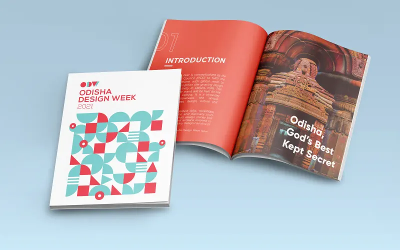 Odisha Design Week 2021 brochure mockup: closed white cover with ODW geometric pattern and open spread with introduction page and temple photograph.