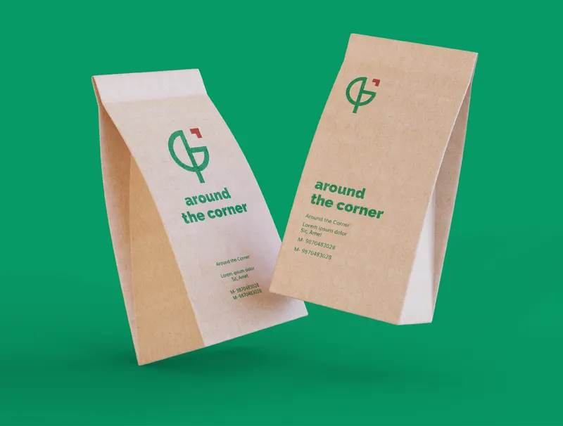 Around the Corner brand on kraft paper bags against a green field.