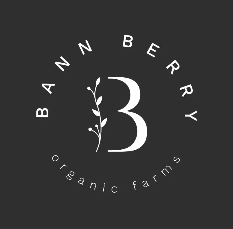 Bann Berry logo lockup in white on a dark field.